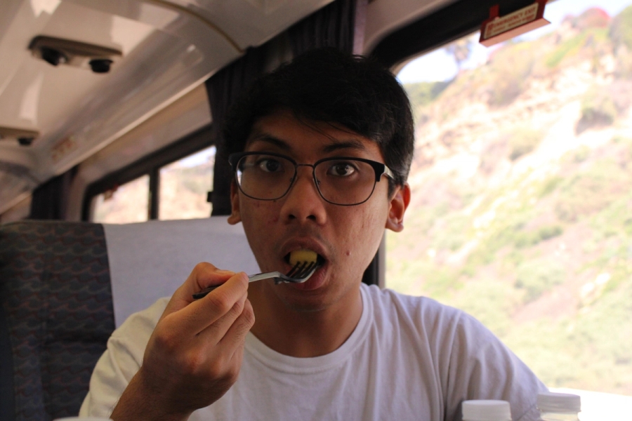 Boy eating.