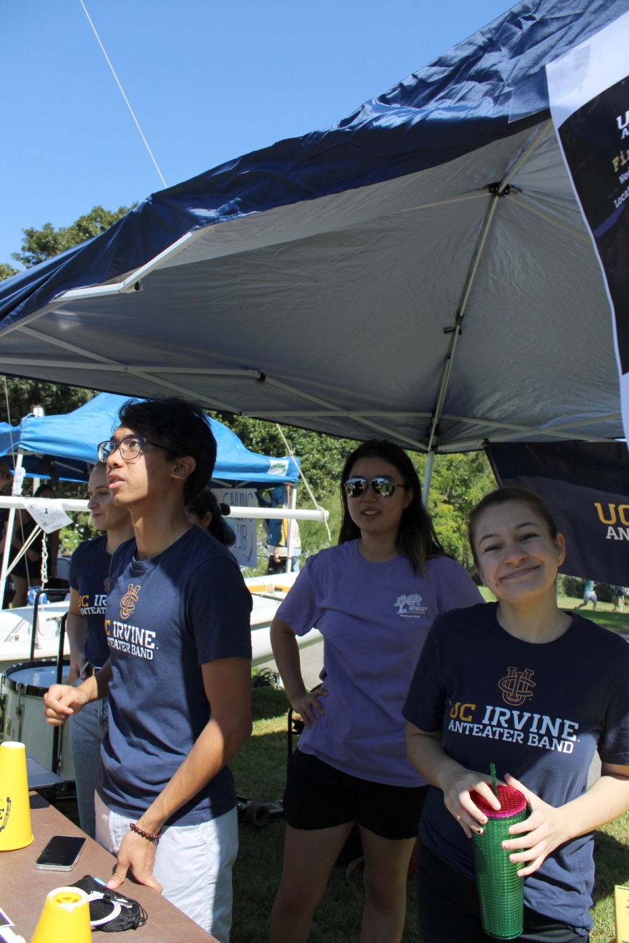 Students under canopy.