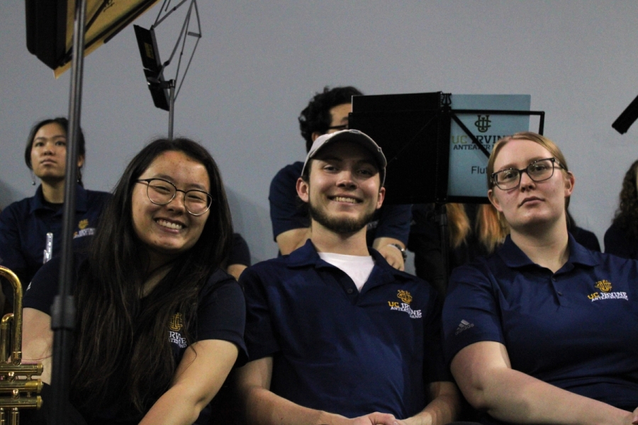 Three trumpets smiling.