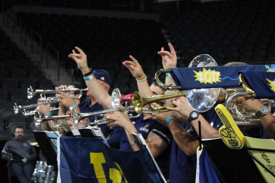 Front row holding instruments and zots.
