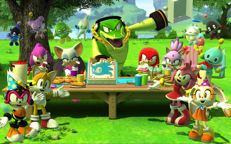 The assembled cast of Sonic x Shadow Generations with a birthday cake for Sonic