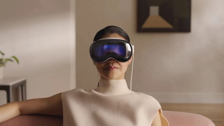 A woman wearing an Apple Pro Vision headset