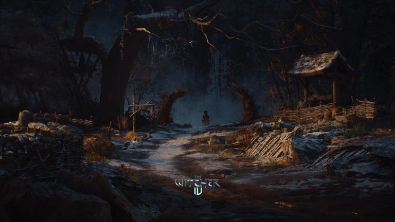 The Witcher IV: A lone figure on a snowy village path at night, with fences and huts.