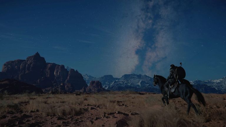 Crimson Desert: A rider on a black horse travels across a rocky plain at night.