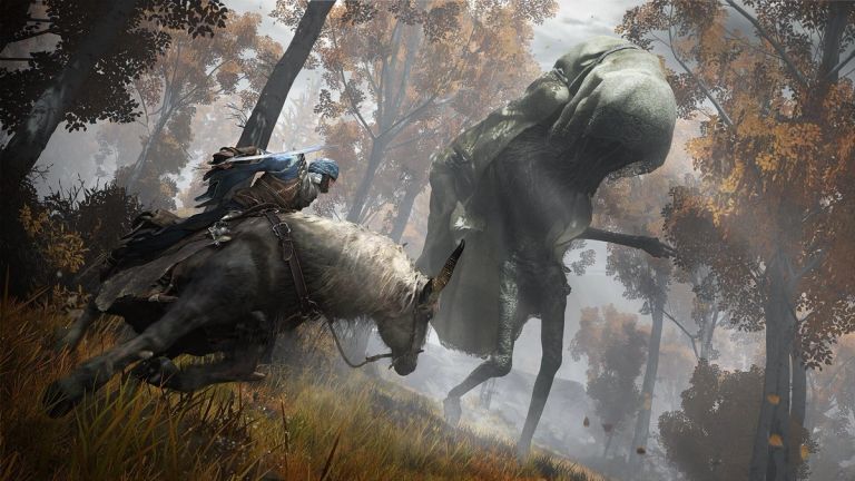 Elden Ring: An armored rider on a horned mount attacks a giant among autumn trees.