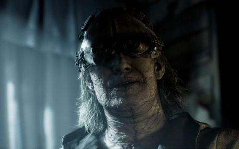 A creepy-looking figure in a mask in Resident Evil Requiem