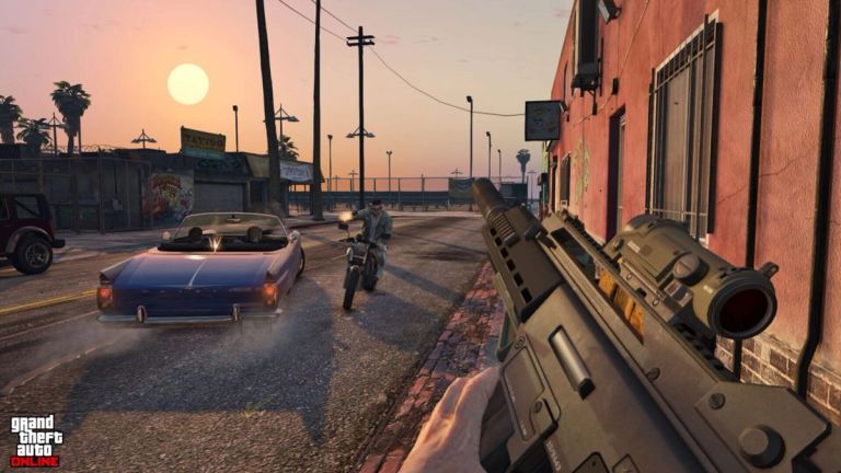 A first-person view shows a rifle pointed down a street at sunset.