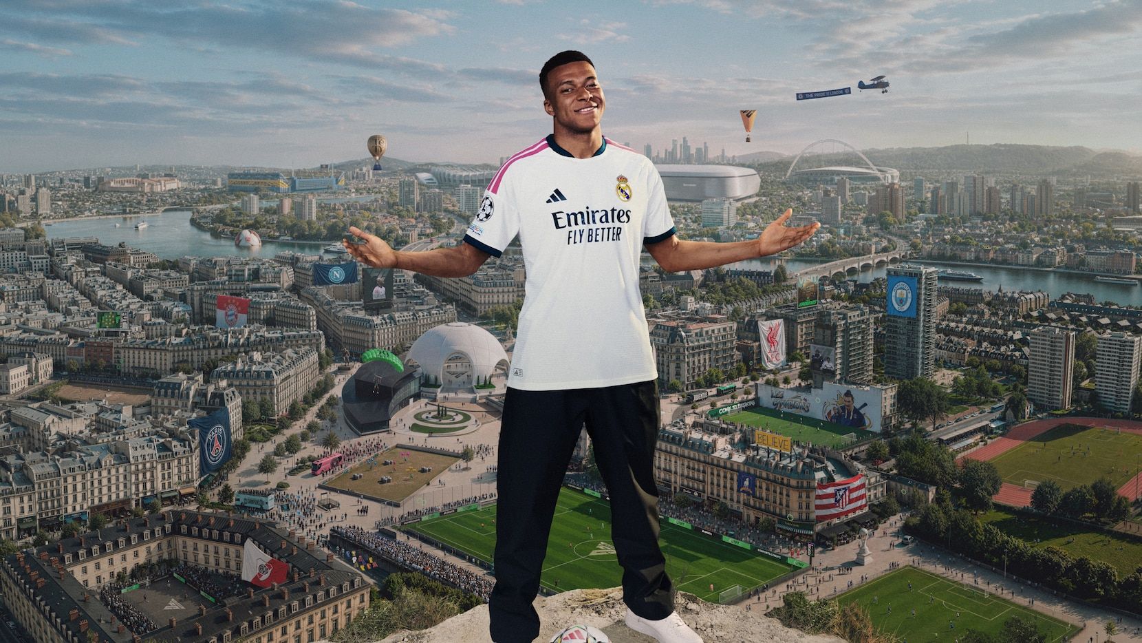 Kylian Mbappé in EA SPORTS FC 27 cover artwork above a city skyline and football pitches.