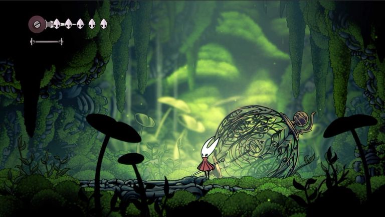 Hollow Knight: Silksong — Hornet stands beside a large ornate green pod in a mossy cavern.