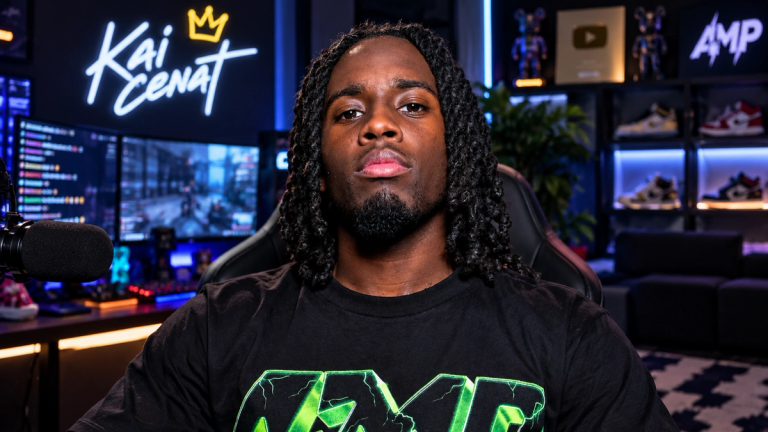 AI-generated image of Kai Cenat with long locs in a black AMP T-shirt, sitting at his neon-lit streaming setup