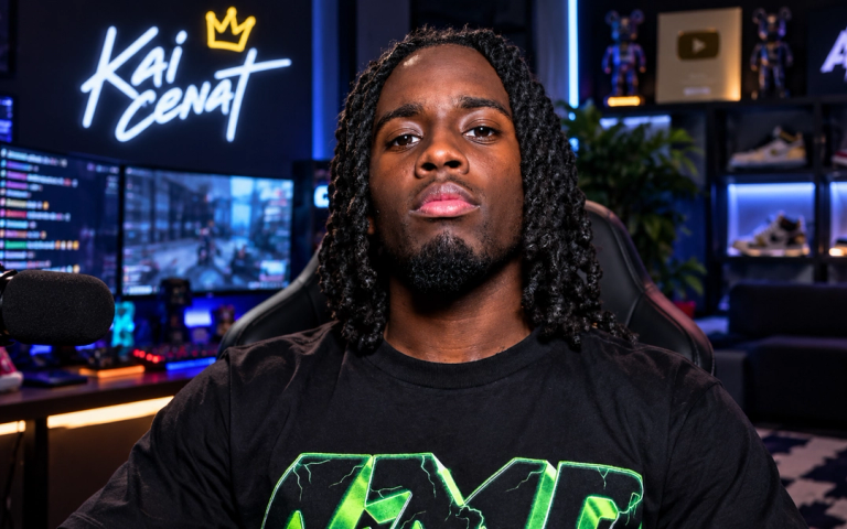 AI-generated image of Kai Cenat with long locs in a black AMP T-shirt, sitting at his neon-lit streaming setup