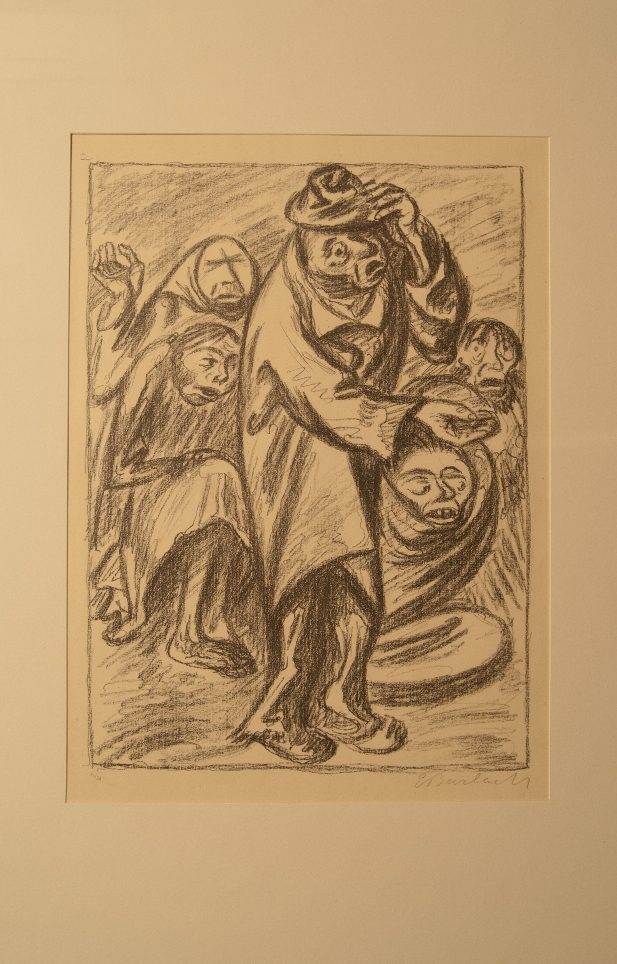 Ein bettelnder Mann im Vordergrund und weitere bettelnde Menschen