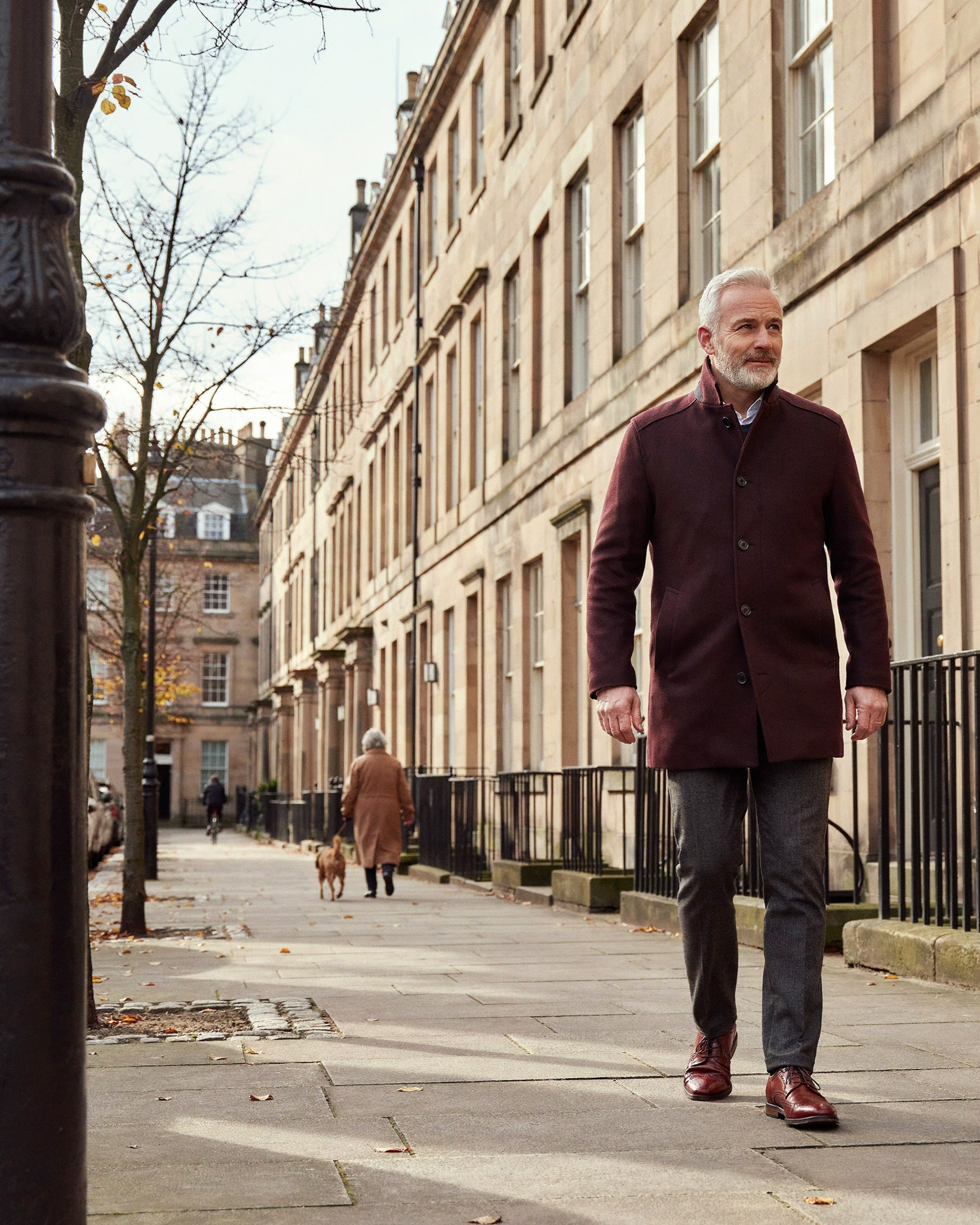 Adult walking through Edinburgh New Town on an autumn morning, self-assured about their weight management choices