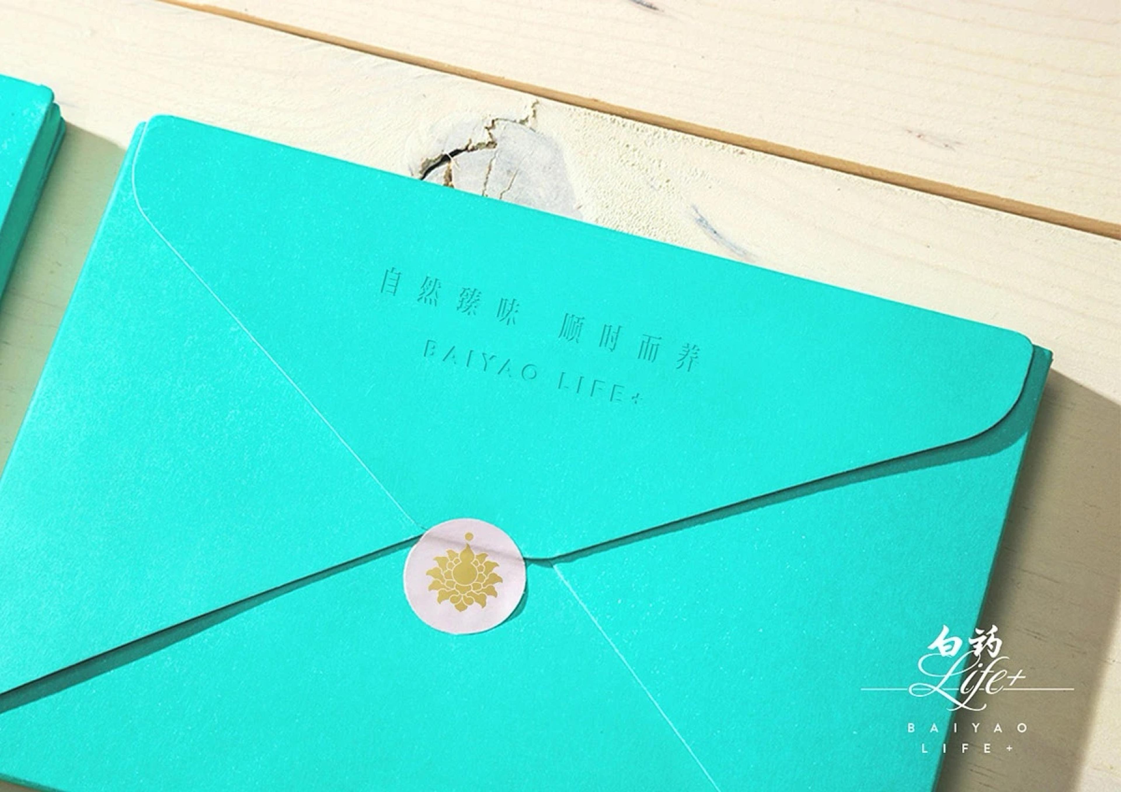 Baiyao LIFE+ teal envelope sealed with a round sticker