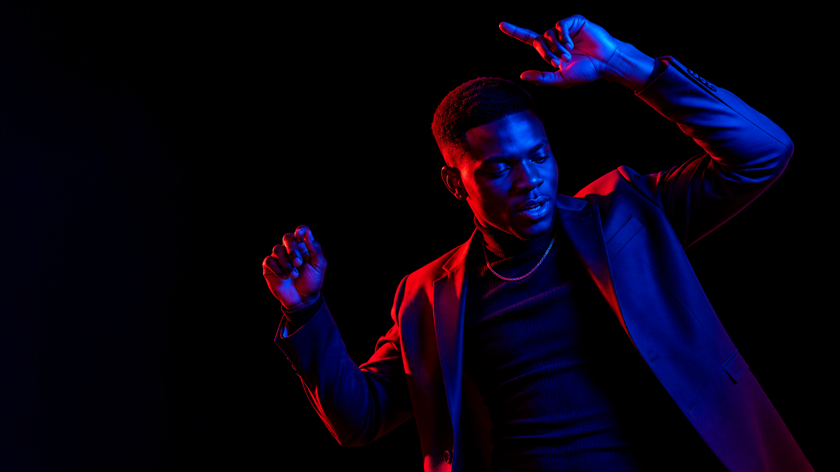 Stylish portrait of a dancing person in neon light