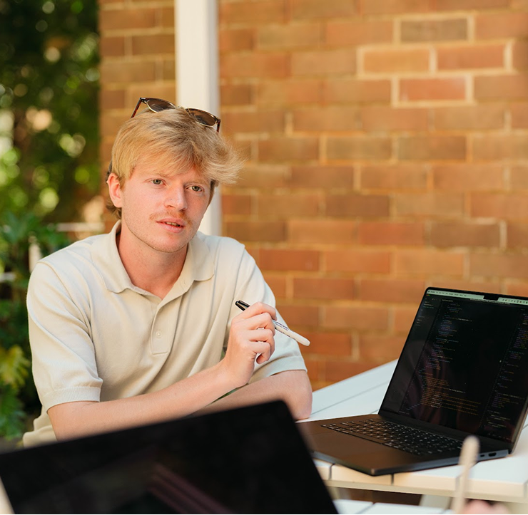 A developer working on an AI-assisted software interface