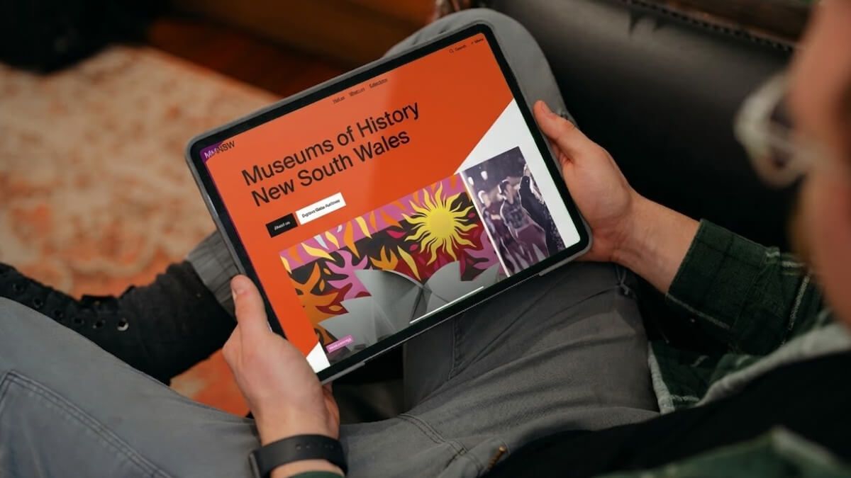 Tablet displaying Museums of History NSW website, illustrating a modern structured content platform