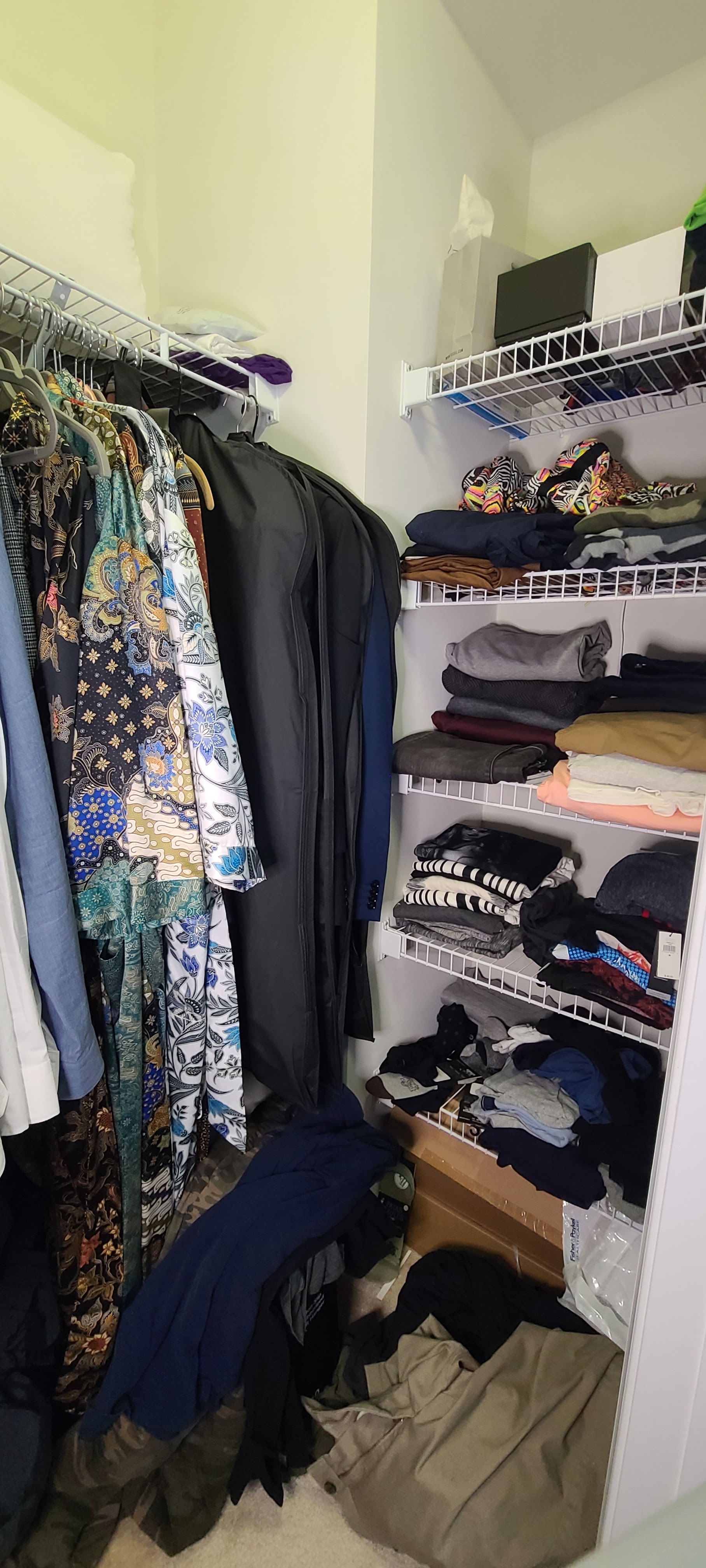 dark, unorganized, builder grade closet.