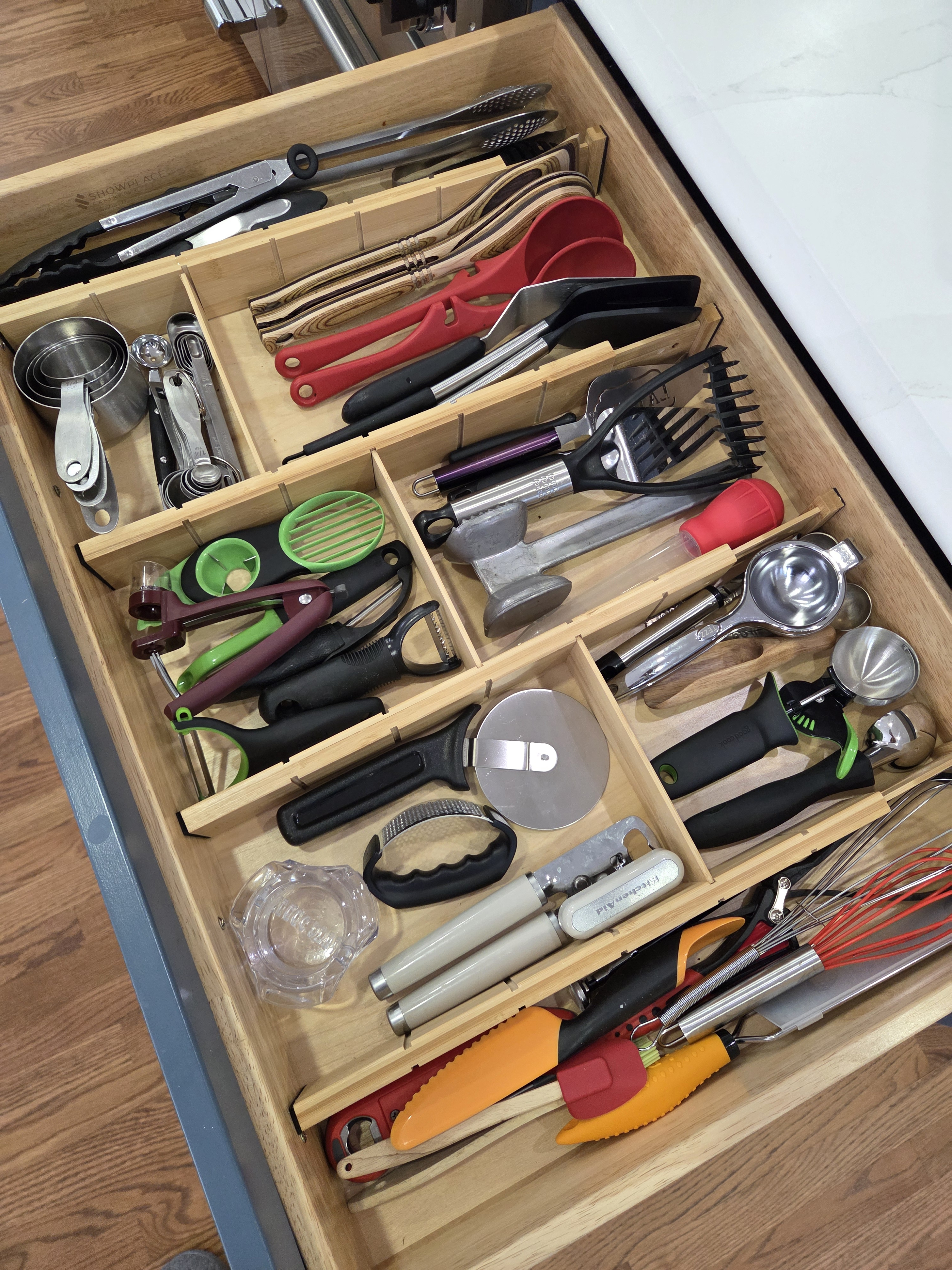 Organized utensil drawer with drawer dividers