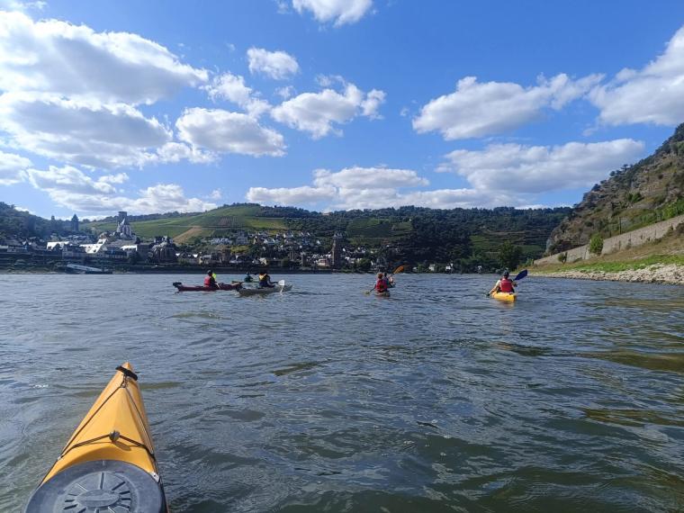 Canoe youth paddling on the Main