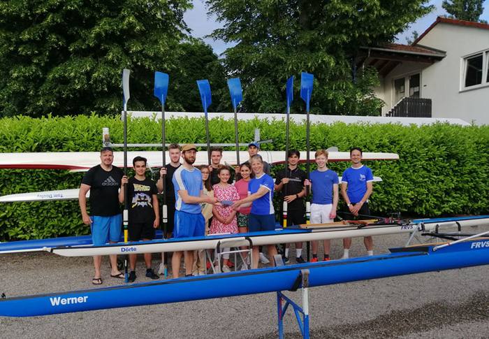 Our rowing youth and Jutta Brüggemann with our boats
