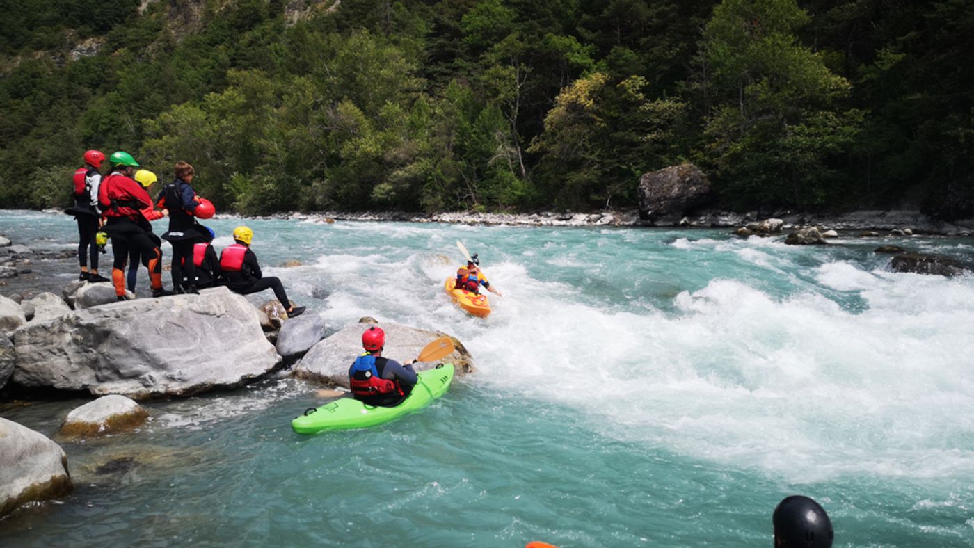 Children kayaking on the river Main