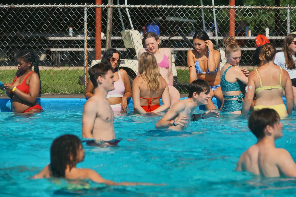 Teen campers swimming in the camp pool