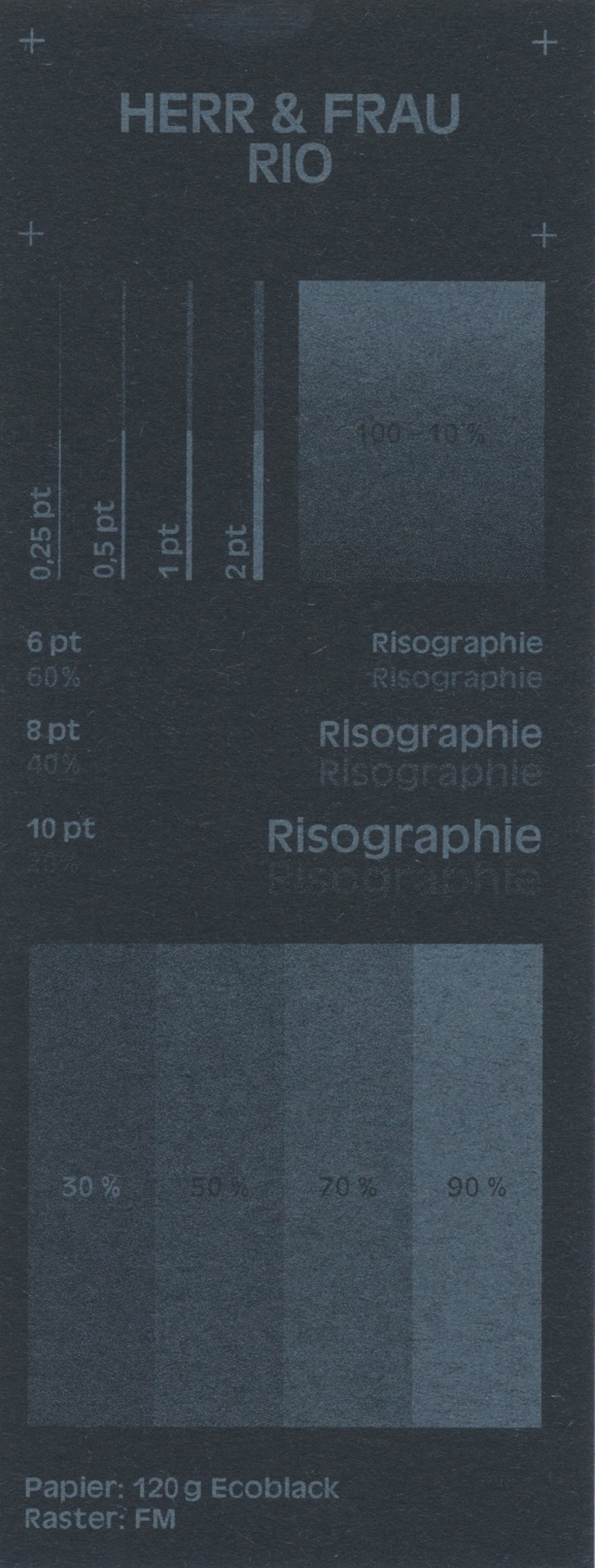 Light grey print on black paper