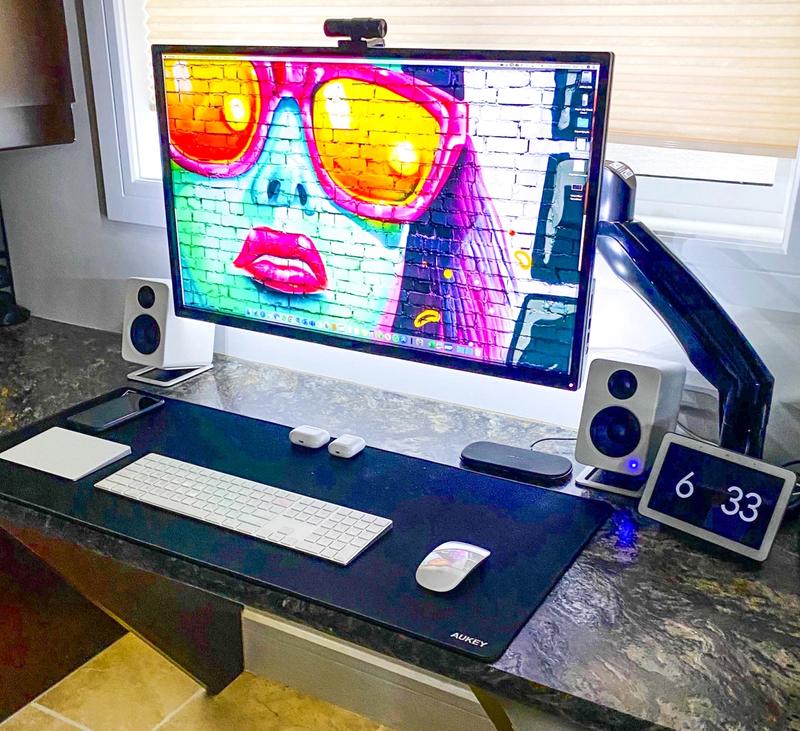 Under-desk Mac Mini setup with 32 inch monitor