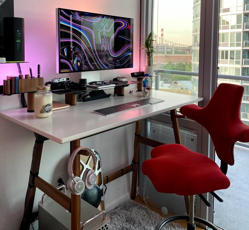 Elegant desk setup with Apple Pro XDR display and Mac Pro
