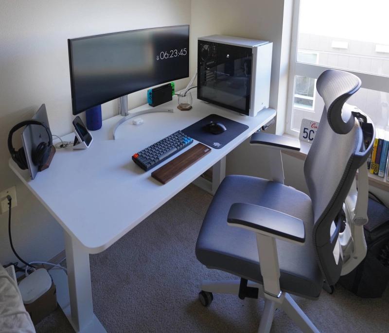 Clean white desk setup with 34 inch Ultrawide monitor