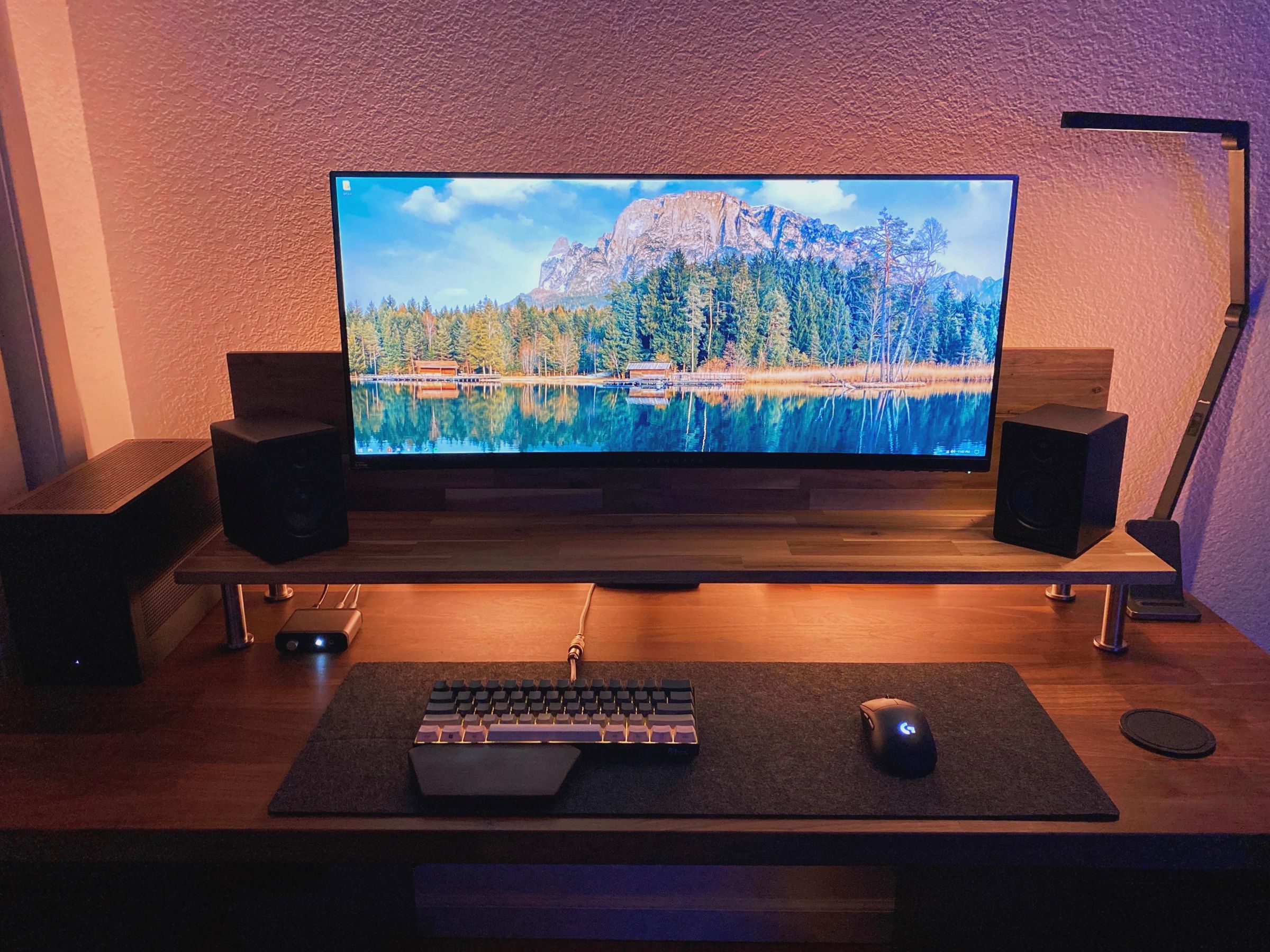 Warm ultrawide setup with DIY IKEA KARLBY desk Remote Setups