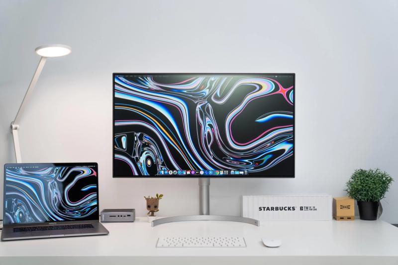 Clean white 32 inch monitor setup