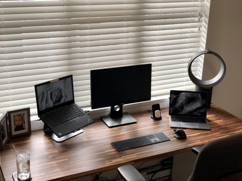 Clean dual laptop setup with DIY IKEA PINNARP and ALEX desk