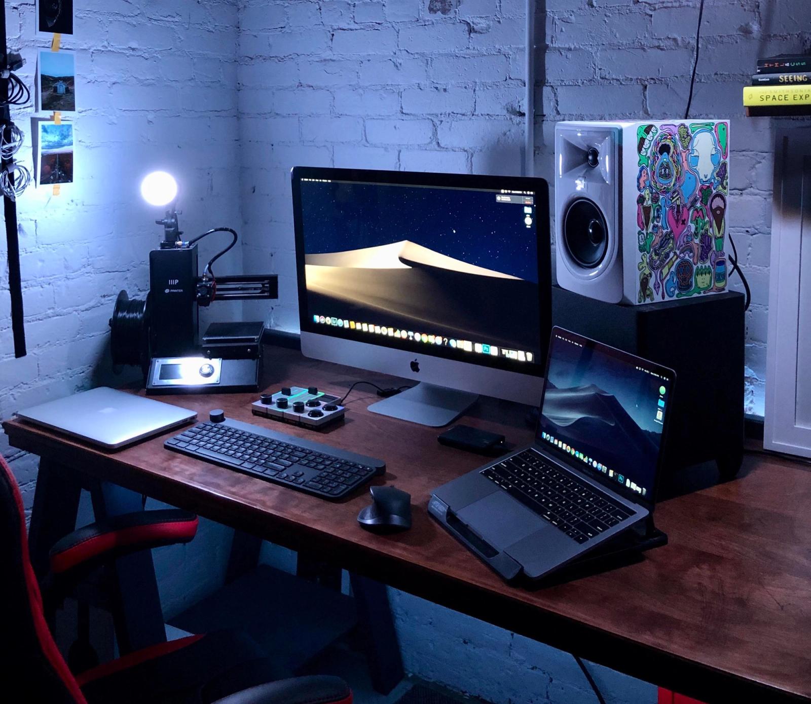 Clean desk setup in artist's loft Remote Setups