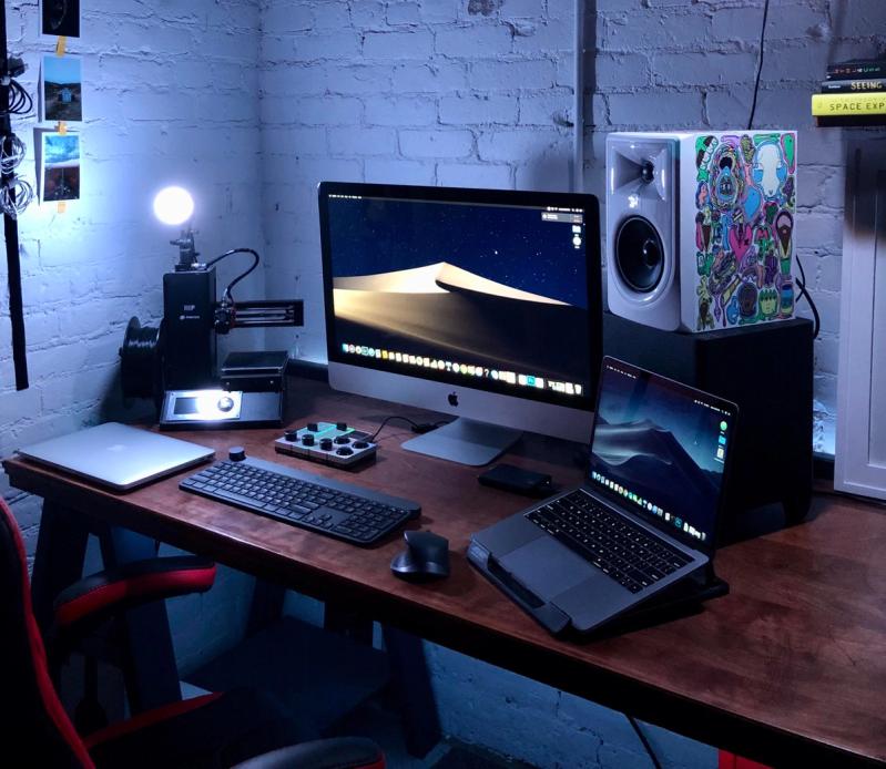 Clean desk setup in artist's loft