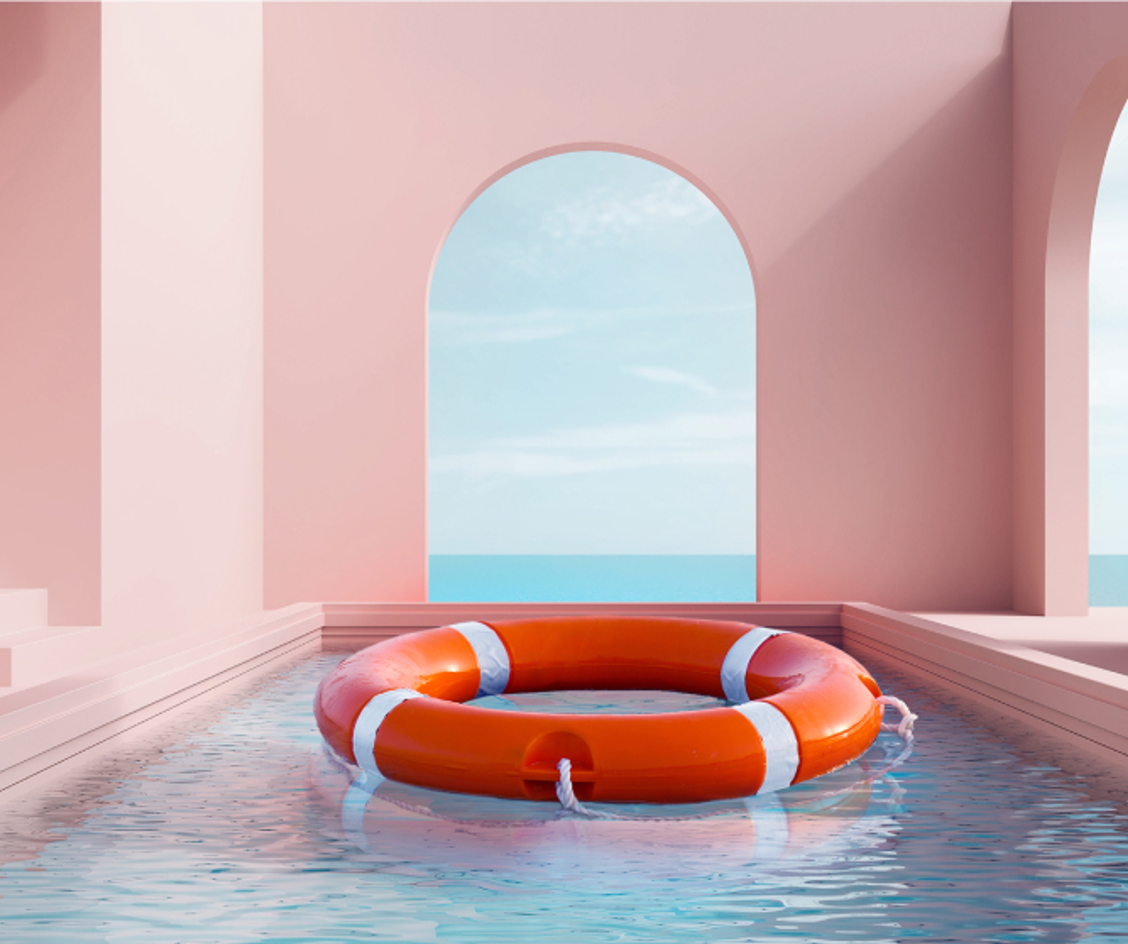 En livbøye som flyter midt i et innendørs basseng. Veggene er rosa og vinduet er buet og rettet ut mot sjøutsikt.
