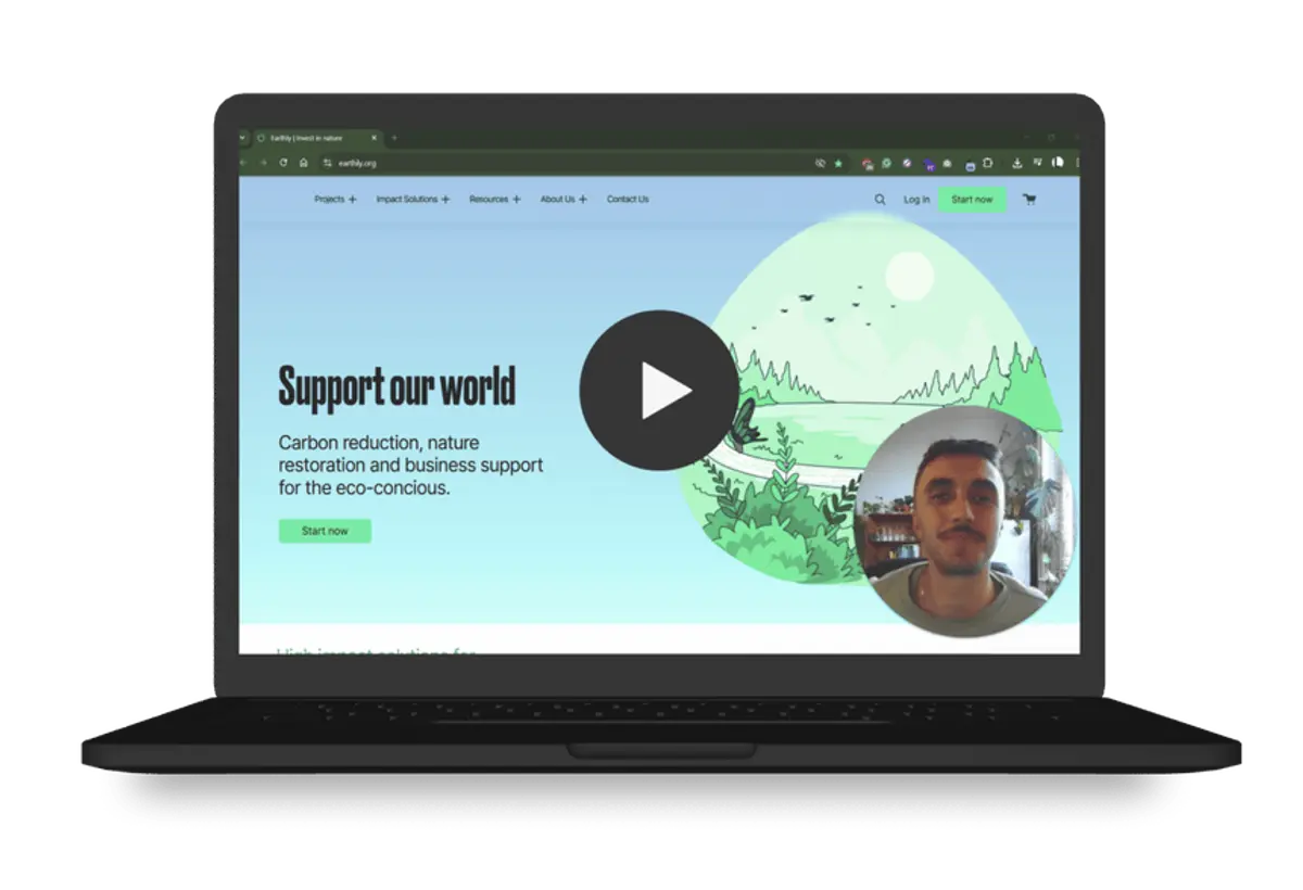 A laptop showing a video website audit of a purpose-driven business website. The video shows Lucian Chevallier walking through the hero section of a website.