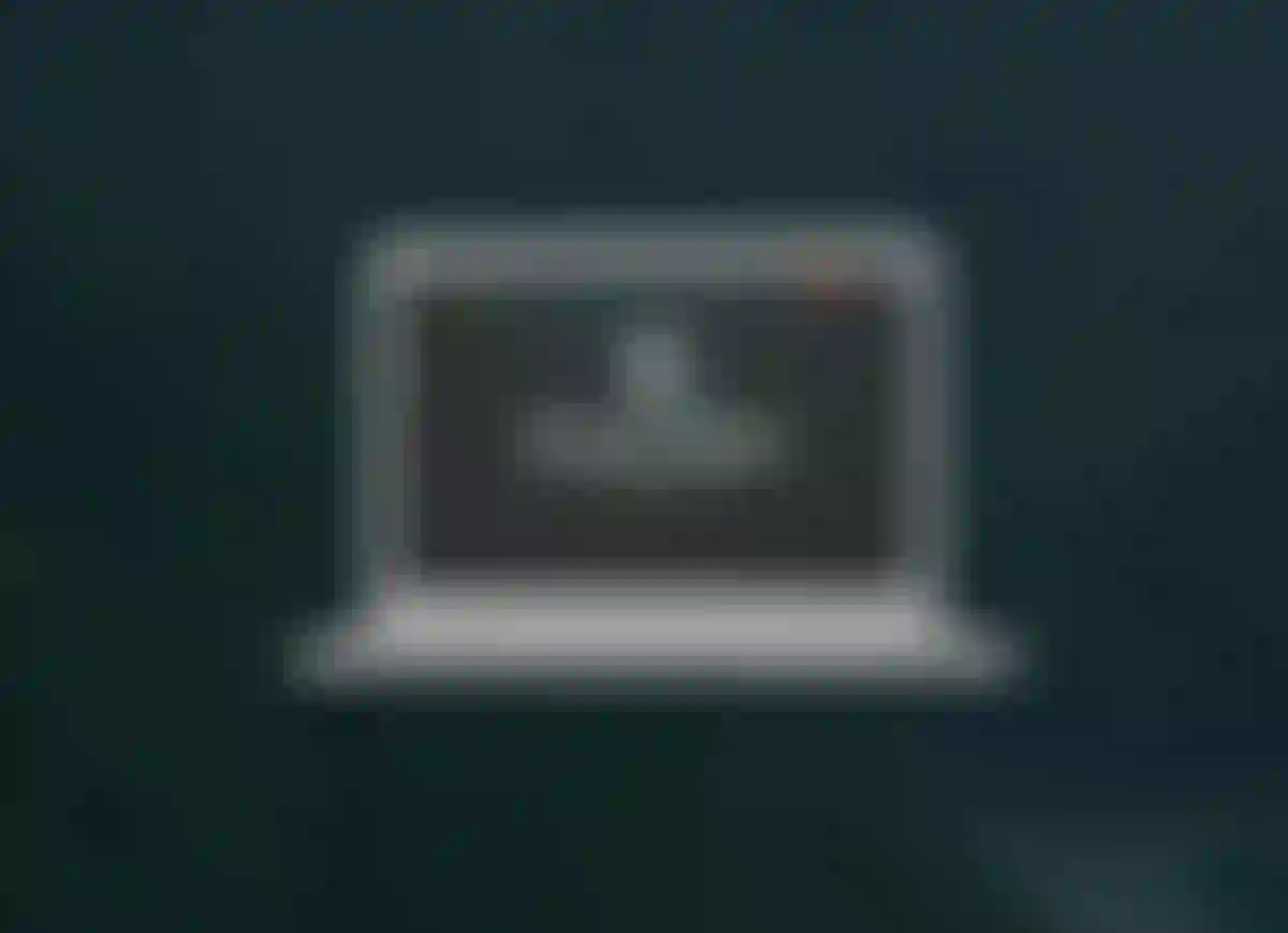 Website mockup of a laptop showing the hero section for the Whole Earth Productions website