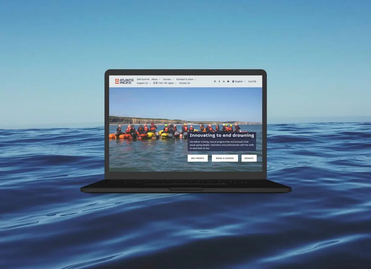 Website mockup of a laptop showing the hero section for the Atlantic Pacific website