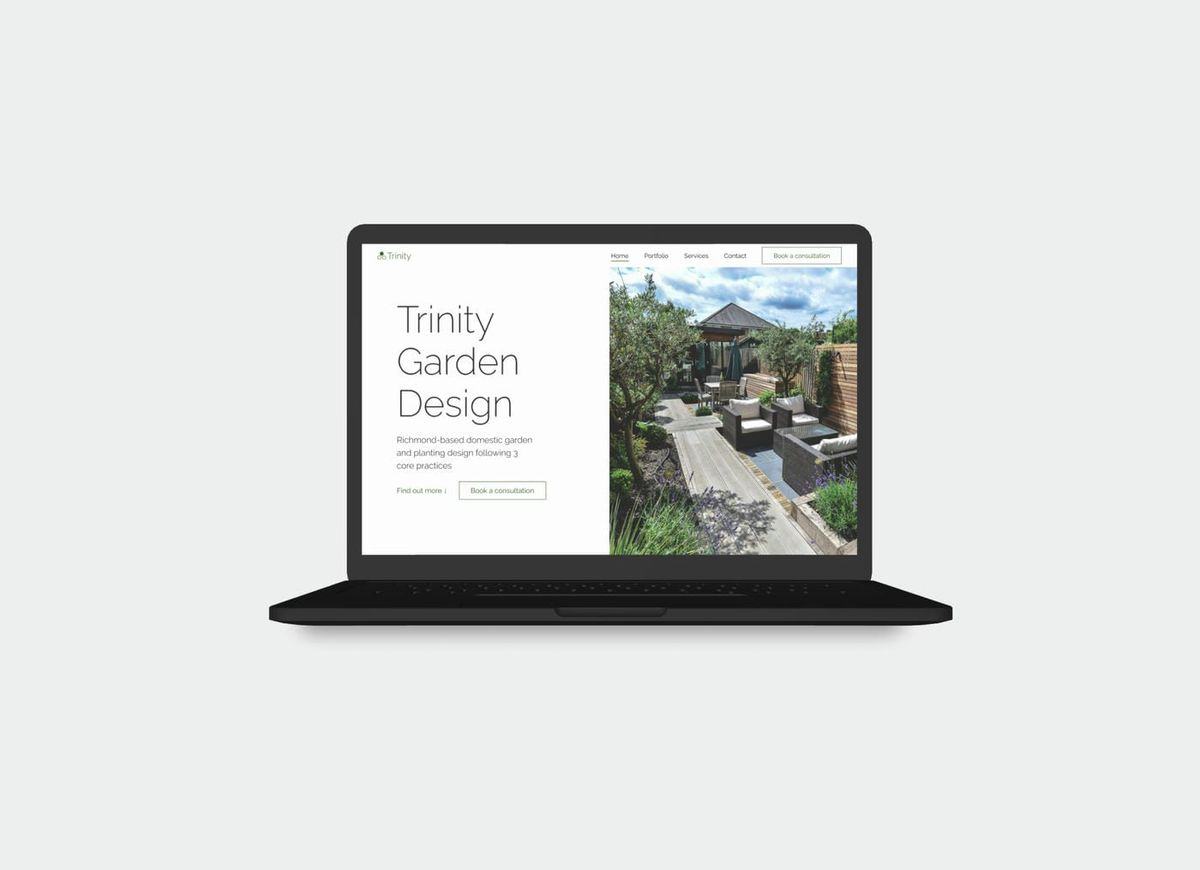 Website mockup of a laptop showing the hero section for the Trinity Garden Design website