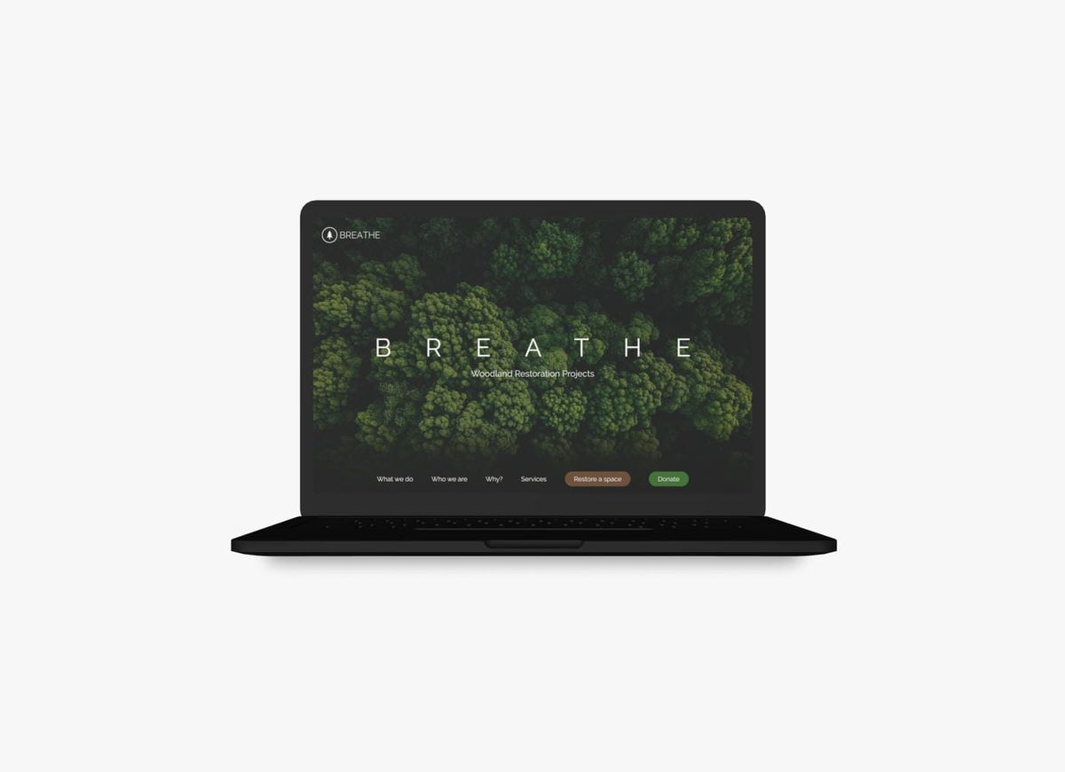 Website mockup of a laptop showing the hero section for the Breathe website