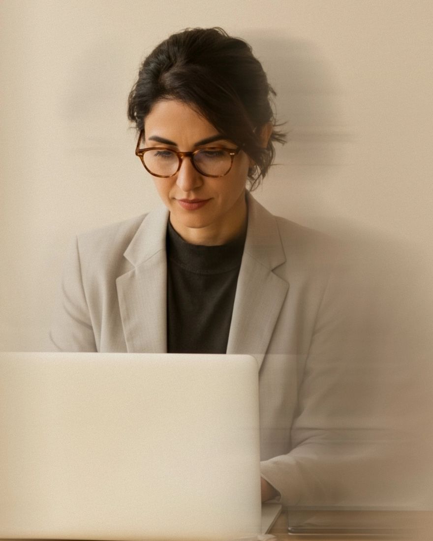 An attorney working on a laptop