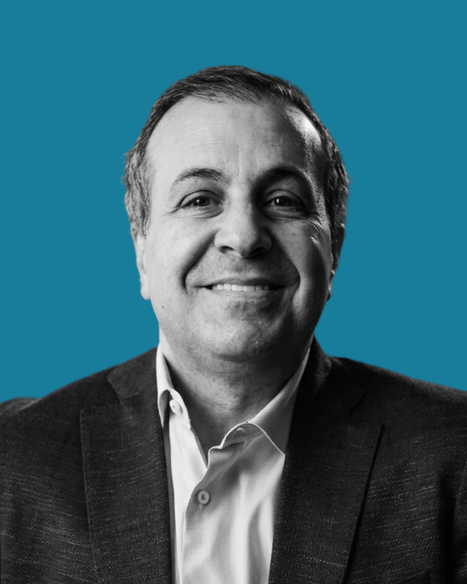 Brian Ricci black and white headshot against blue background