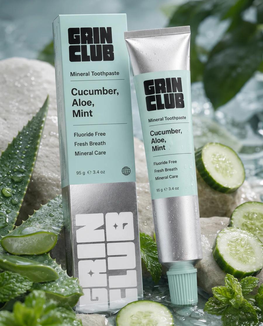 Two Grin Club tubes standing together in cucumber and mint.