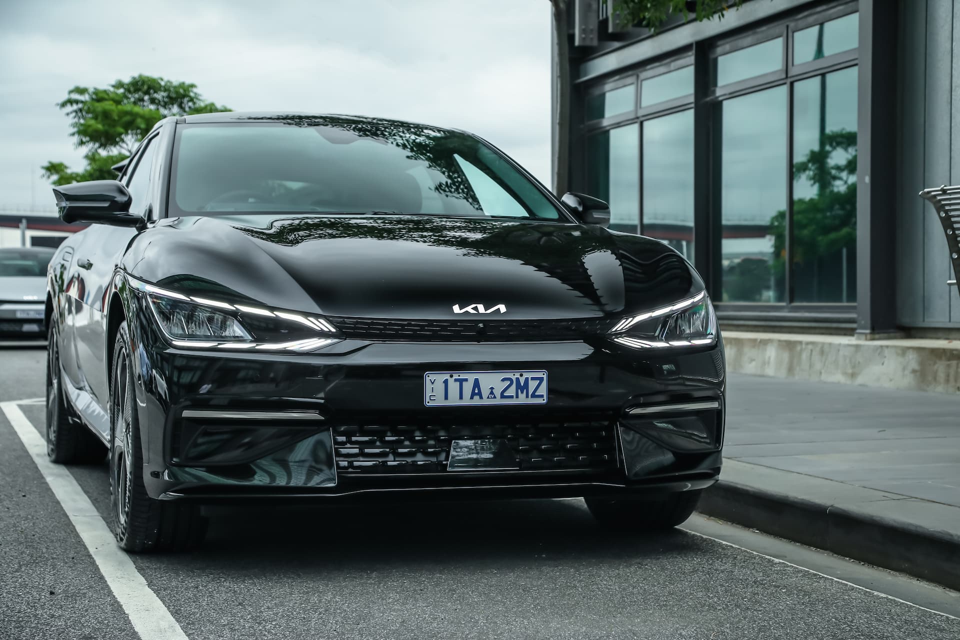 Black Kia EV6 GT-Line RWD parked beside city street