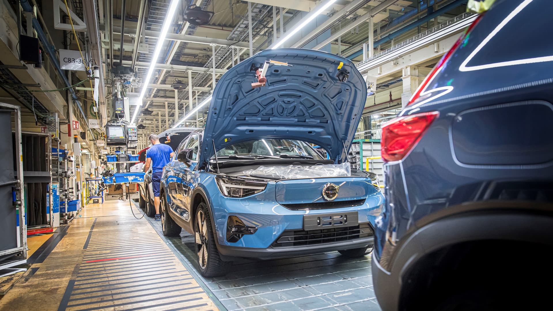 Blue Volvo C40 in factory assembly line