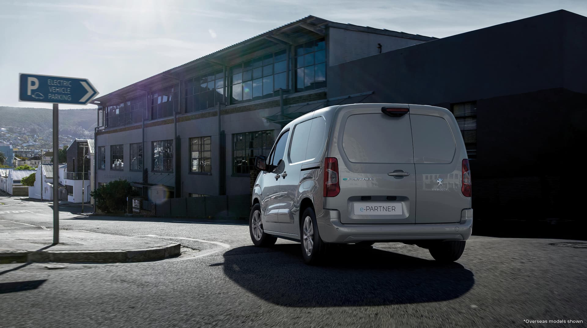 Peugeot e-Partner van charging port and rear views
