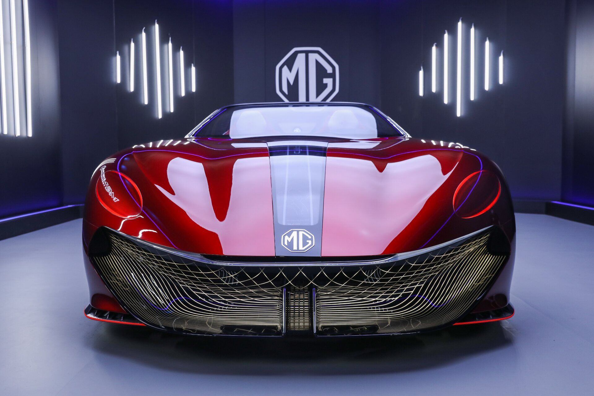 MG Cyberster in red front view with MG logo background