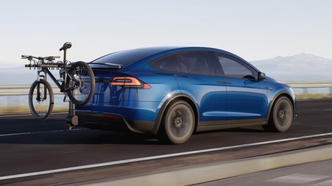 Tesla x deals towing range